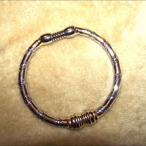 Goldtone Spring Open Bangle Bracelet